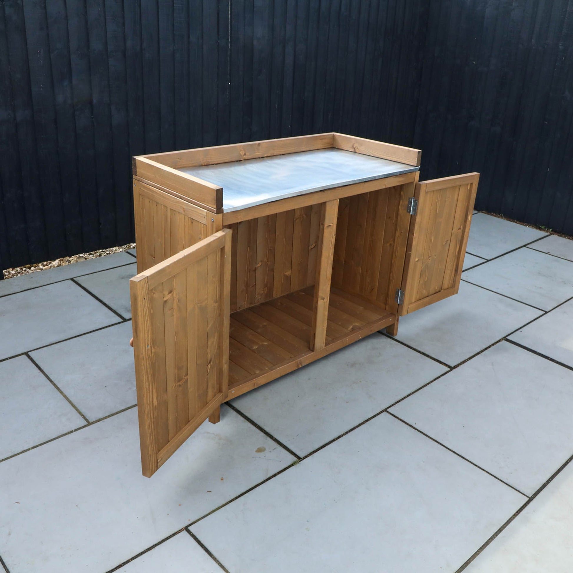 A timber unit that forms part of an outdoor kitchen