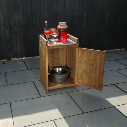 A cabinet from a timber outdoor kitchen