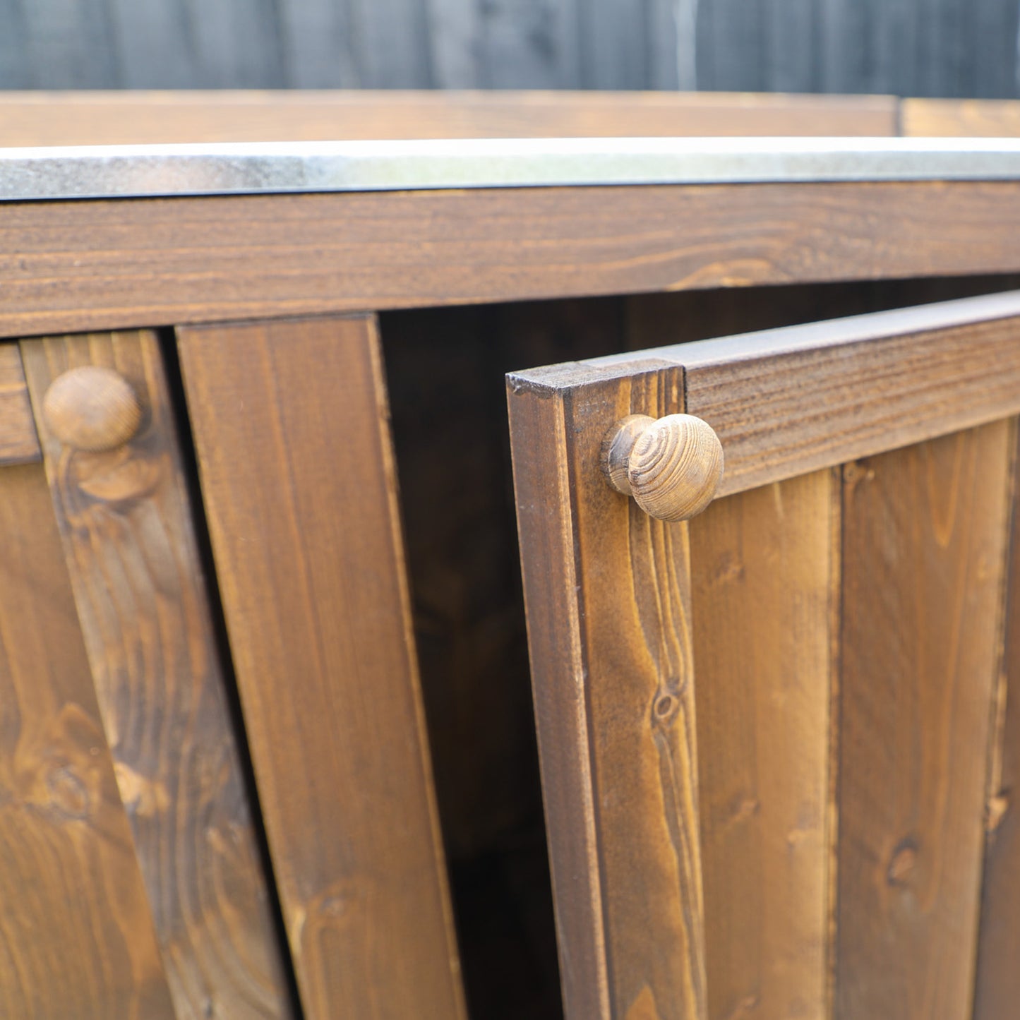 An outdoor kitchen manufactured from timber