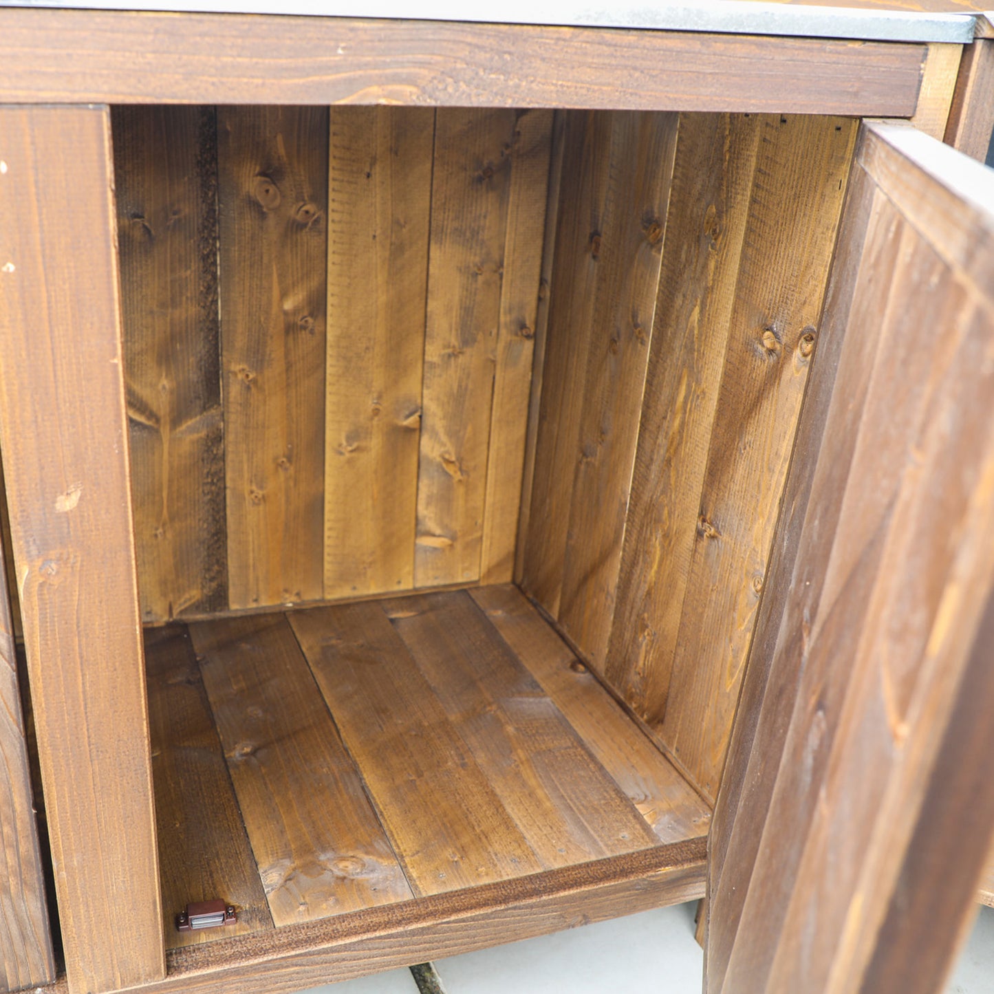 An outdoor kitchen manufactured from timber