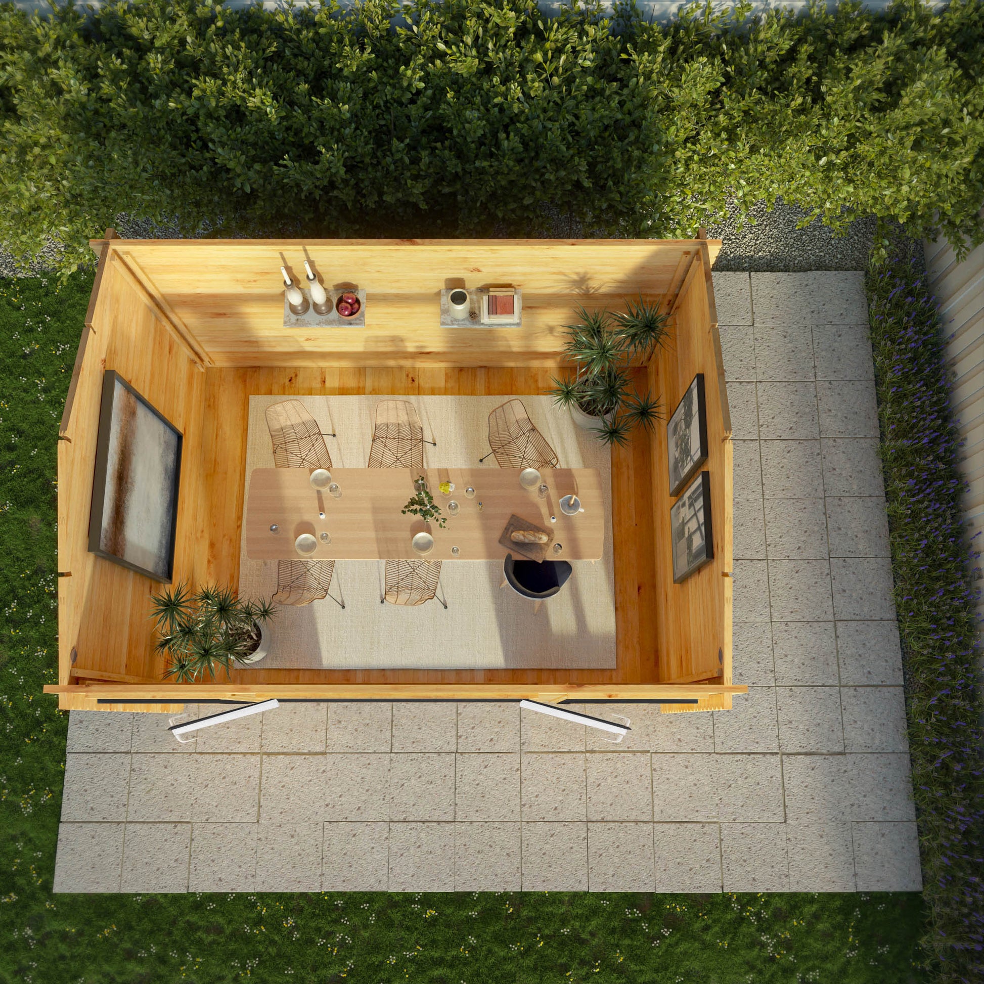 A modern timber log cabin with pent roof, full length windows, double doors in grey UPVC being used as a dining room