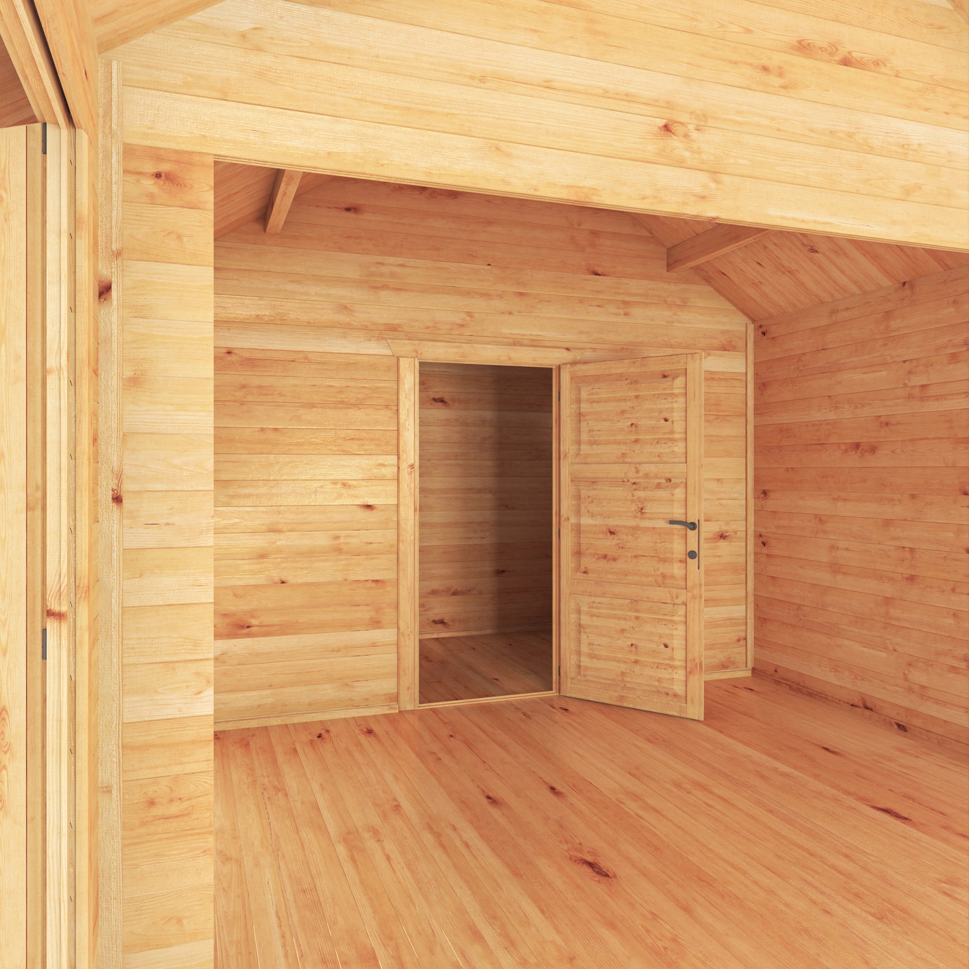 The inside of a Large timber log cabin, with apex roof, full length windows, double doors in a modern garden. Being used as a home gym and computer gaming room.