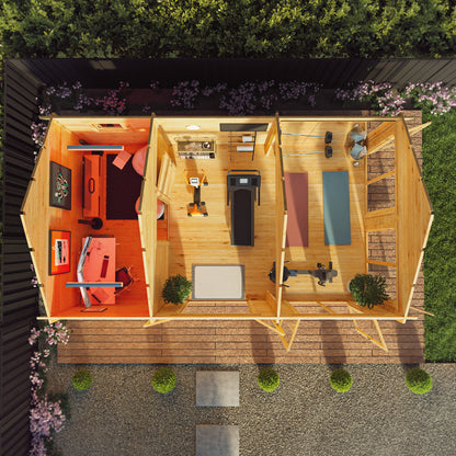 Large timber log cabin, with apex roof, full length windows, double doors in a modern garden. Being used as a home gym and computer gaming room.