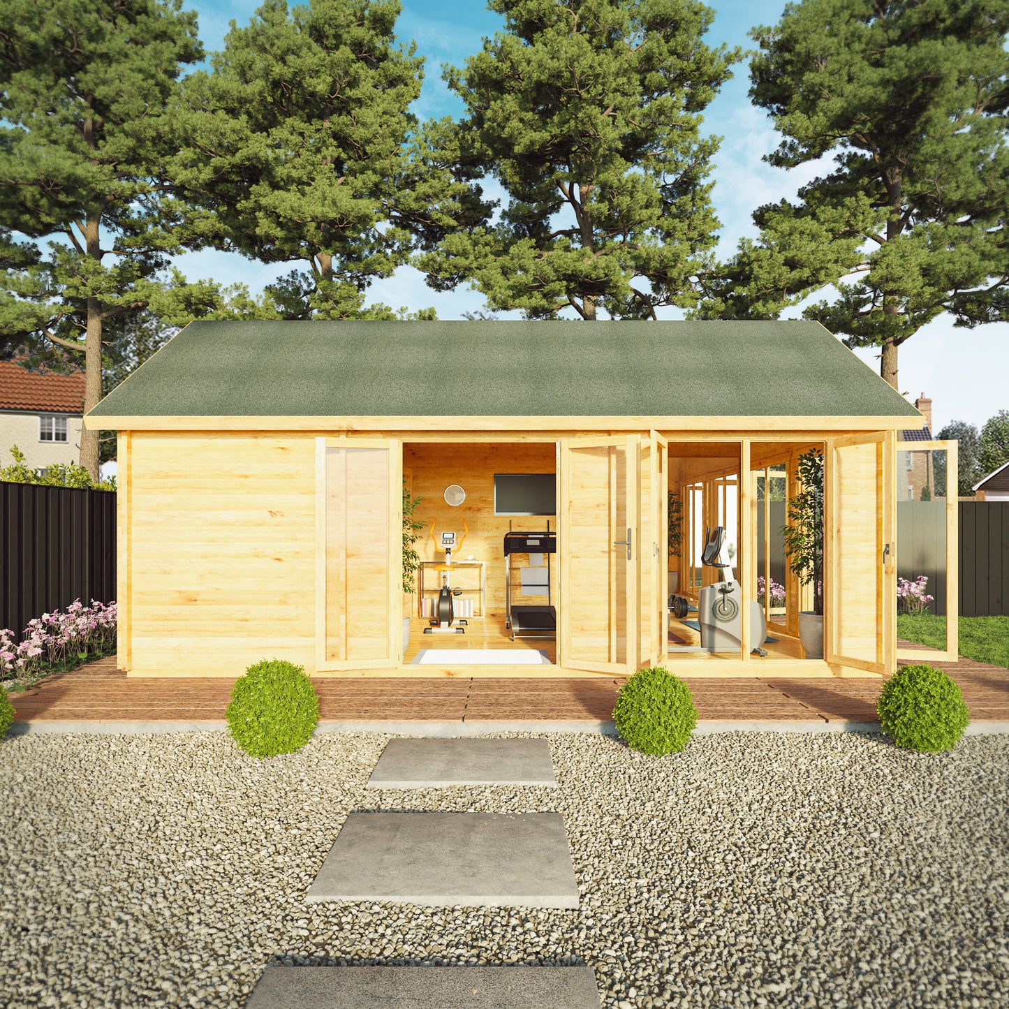 Large timber log cabin, with apex roof, full length windows, double doors in a modern garden. Being used as a home gym and computer gaming room.