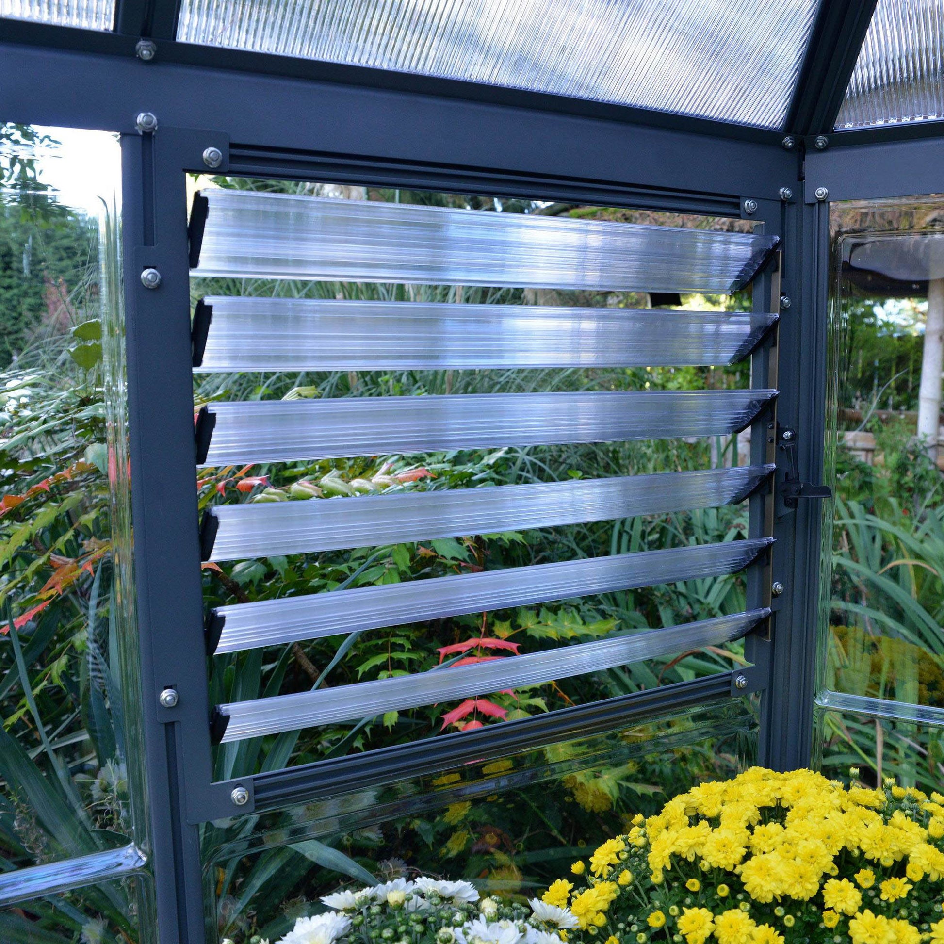 An opening air vent on a greenhouse